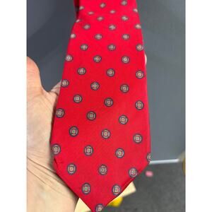 vintage Hardy Amies Tie 100% silk  deep red with a geometric circle pattern.